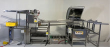 Load image into Gallery viewer, Starting from the left, the picture shows the pneumatic deboxer, automated uncapper, horizontal extractor and out-feed table on the right.  The cappings press fits under the uncapper.  Honey sump collects honey from cappings press and extractor with pump outlet in the middle.  Picture does not show the pneumatic frame pusher and the honey pump.  
